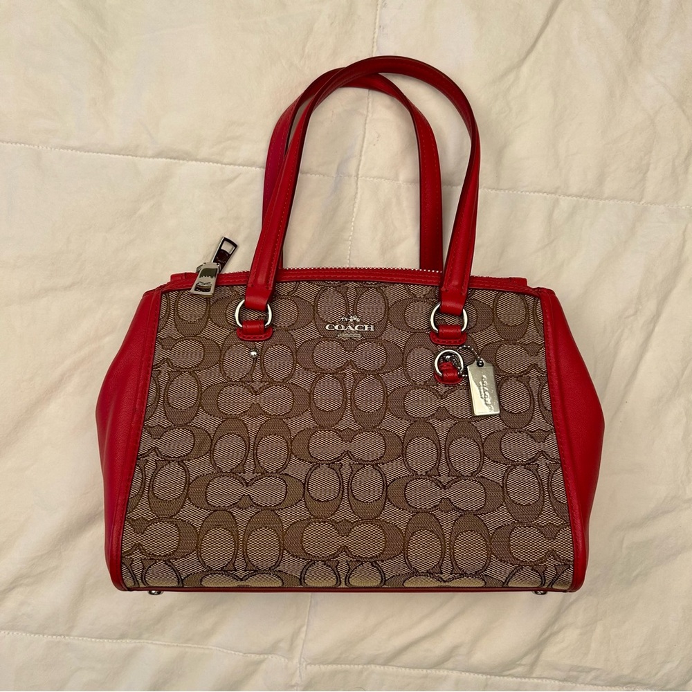 Small red and brown Coach handbag